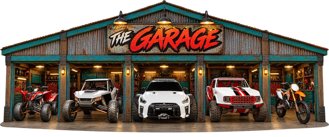 The Garage with five vehicles in their bays